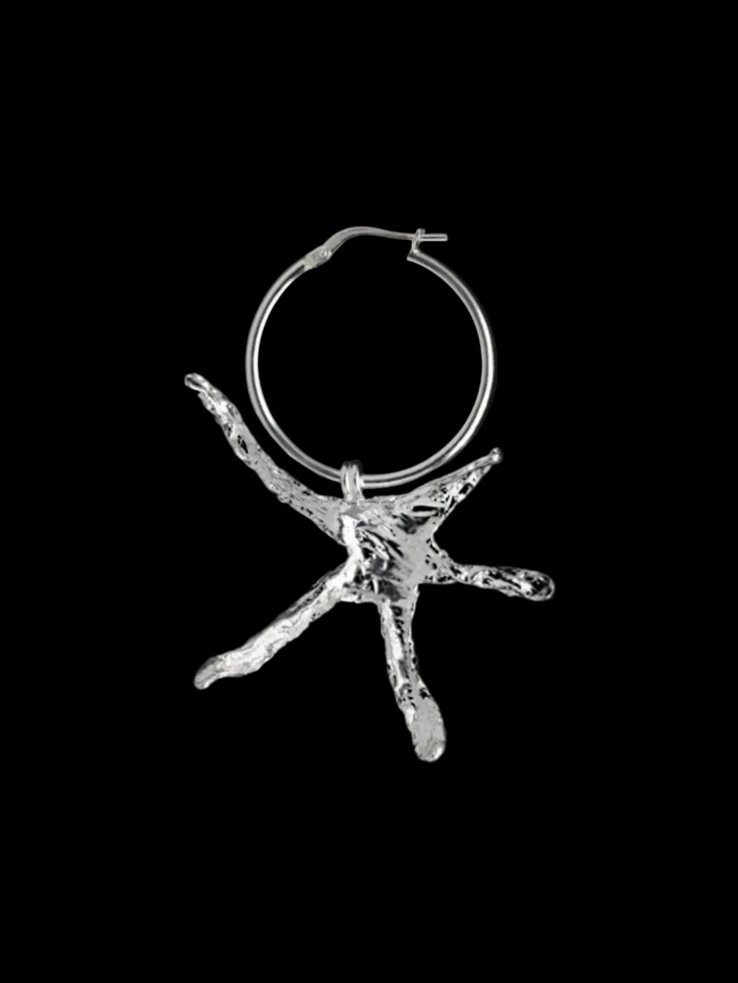 Large organic star shaped hoop earrings handmade in silver