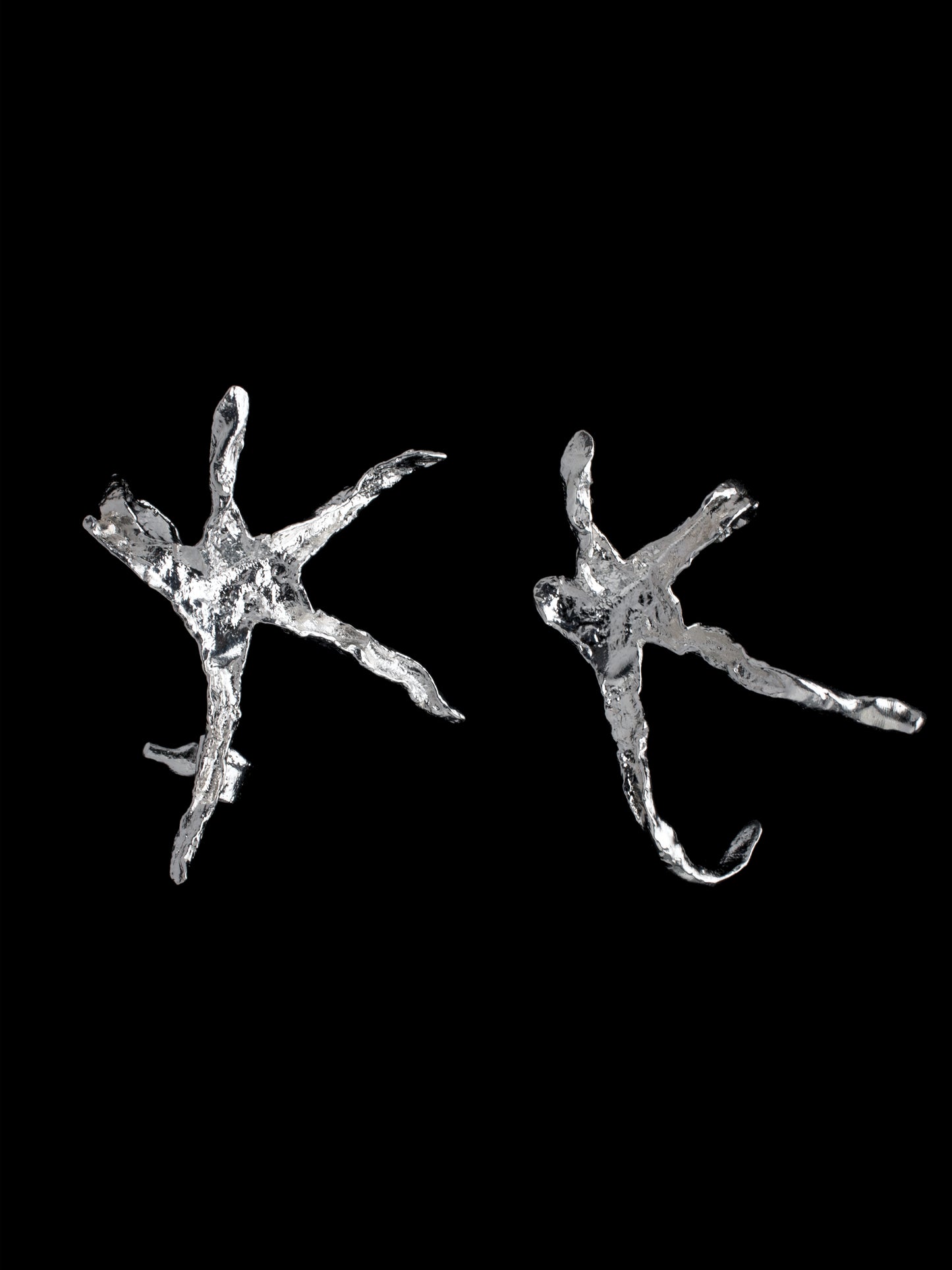 Organic star shaped ear cuffs handmade in silver