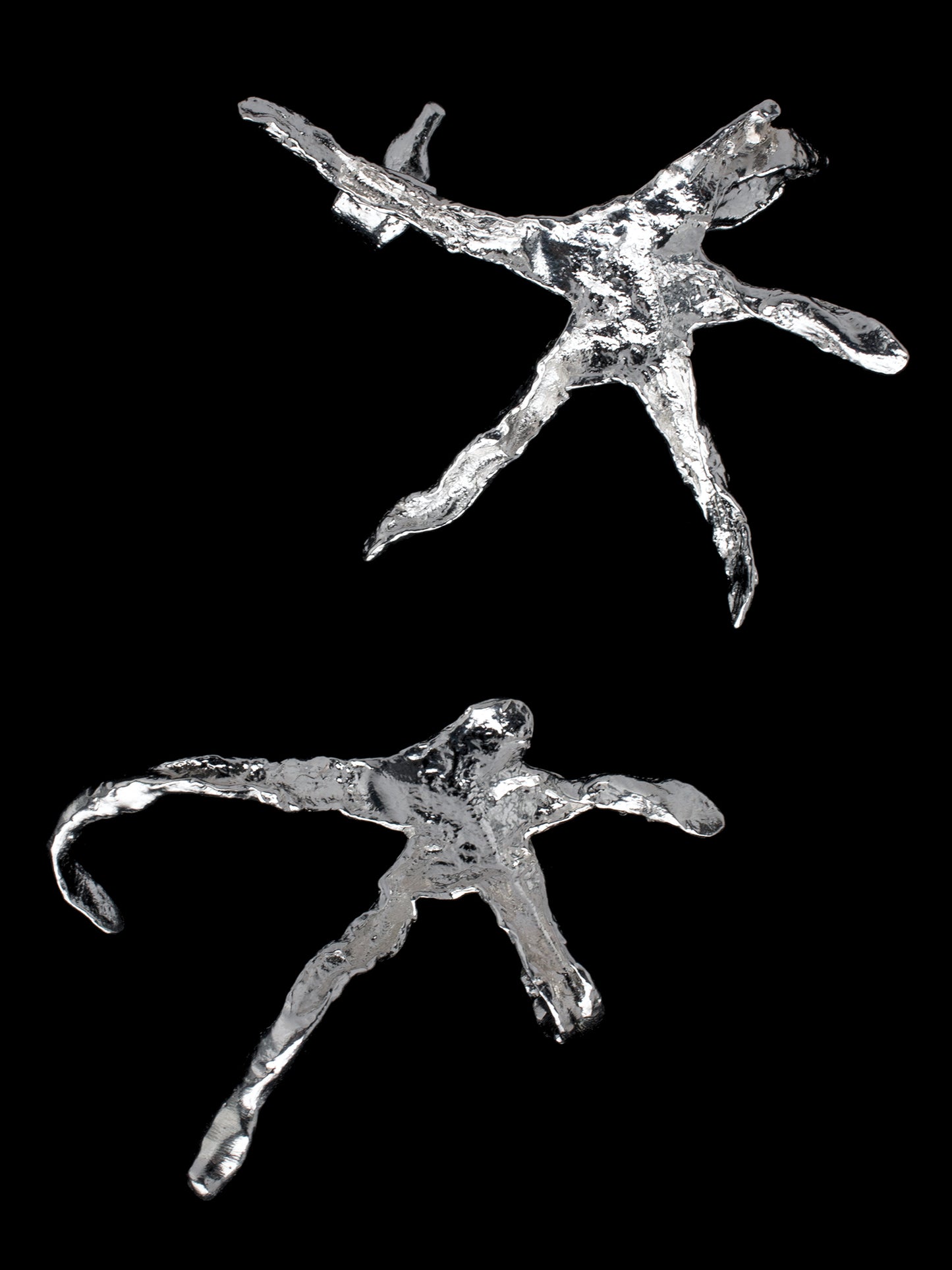 Organic star shaped ear cuffs handmade in silver