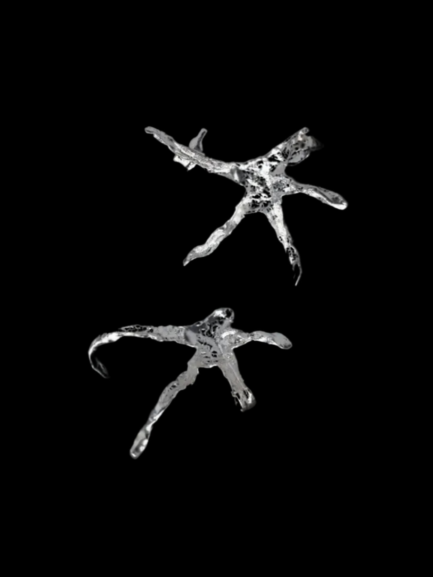 Organic star shaped ear cuffs handmade in silver