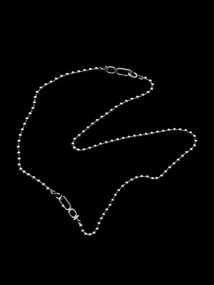 2 in 1 ball chain necklace and bracelet with monogram claps by Montreal based jewellery studio Coming Age