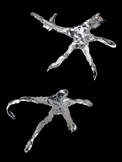 Organic star shaped ear cuffs handmade in silver