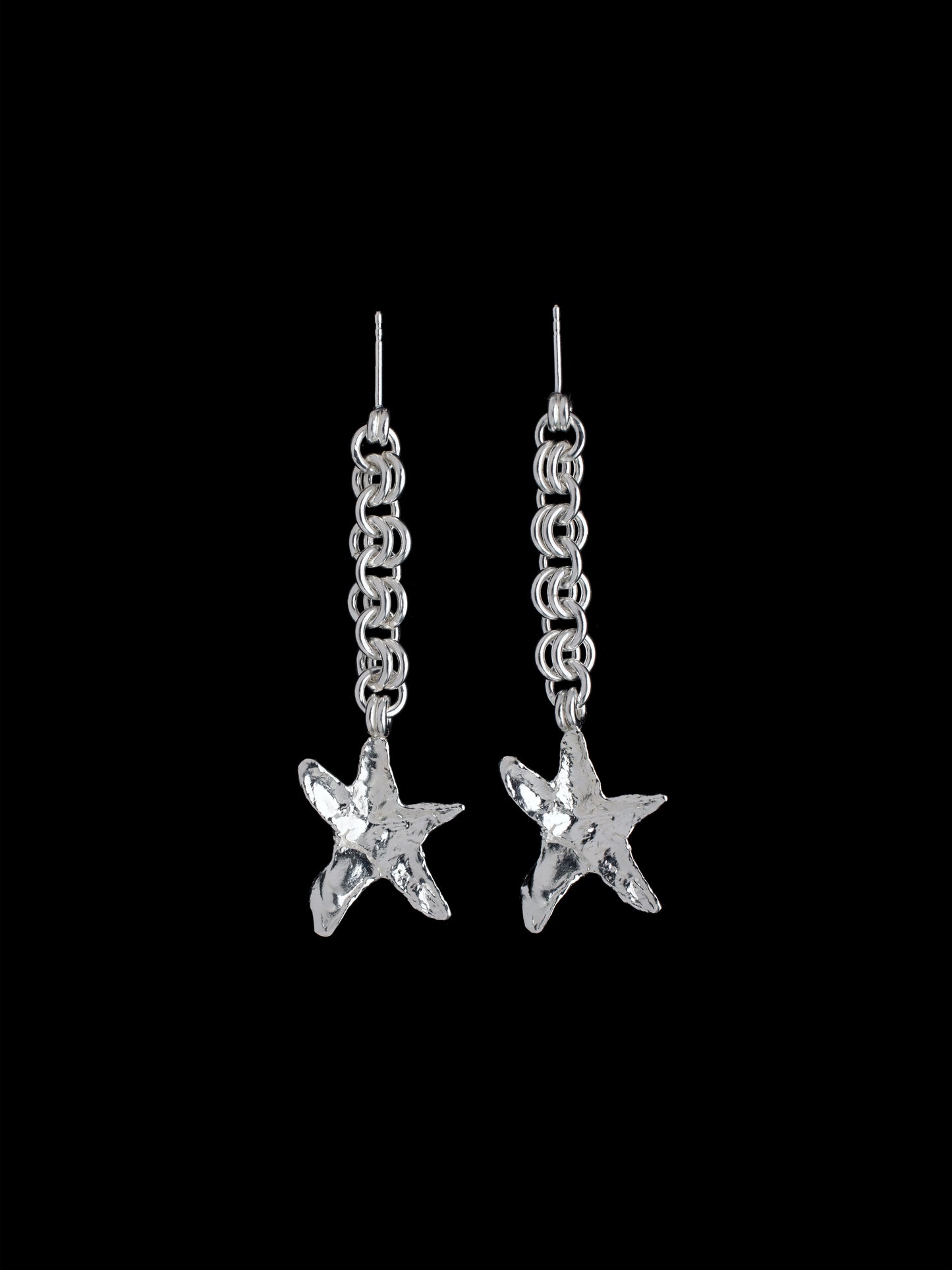 Chain earrings with organic star shaped pendant handmade in silver